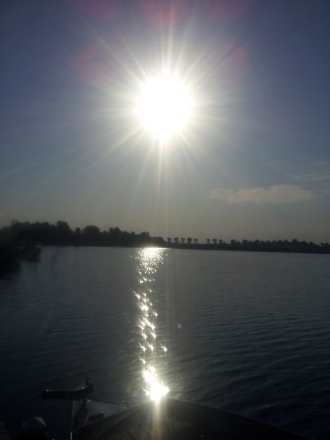Amsterdam: Dutch Countryside Sunset Canoe Tour - The short setup on land: safety, walking, and getting ready to paddle