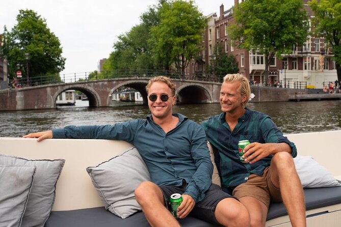 Amsterdam: Evening Candle Light Cruise With Wine & Cheese - Floating Amsterdam near Dam Square: how boarding usually works