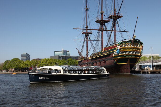 Amsterdam Family-Friendly Canal Cruise with Snackbox Option - Seating, weather cover, and photo tips for a rainy or sunny Amsterdam day