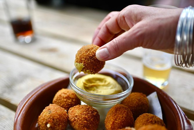 Amsterdam Food Tour of 10+ Local Classic Tastings in Jordaan Area - Westertoren, Anne Frank area, and a LGBTQ memorial: the route has meaning
