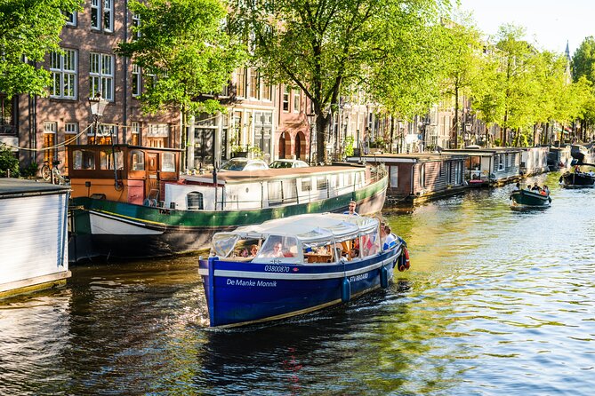 Amsterdam: German-speaking boat trip with bar on board - Key highlights at a glance