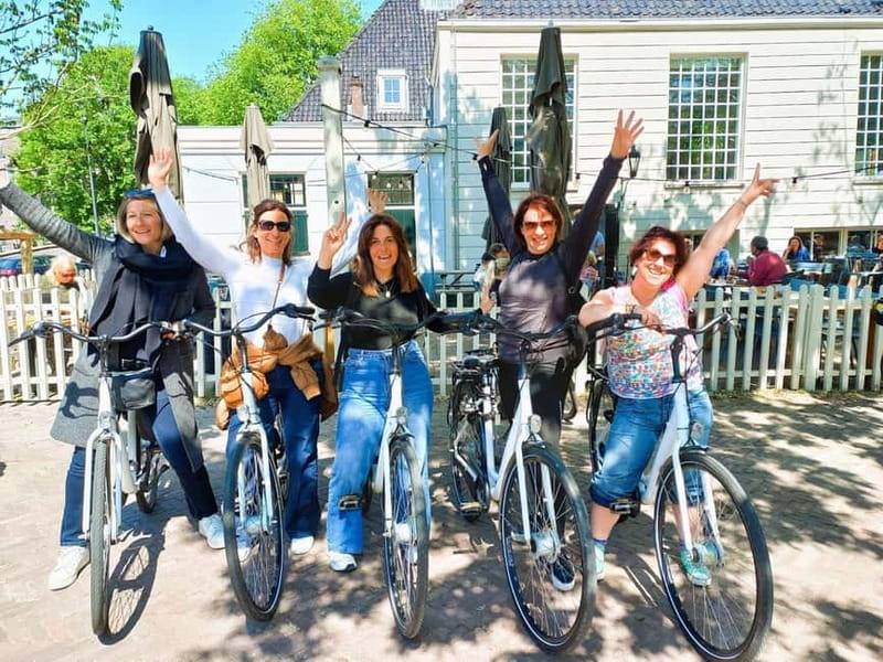 Amsterdam: Guided bike tour in French off the beaten track - Meet-up at Bike Rental Reine: easy start, no wasted time