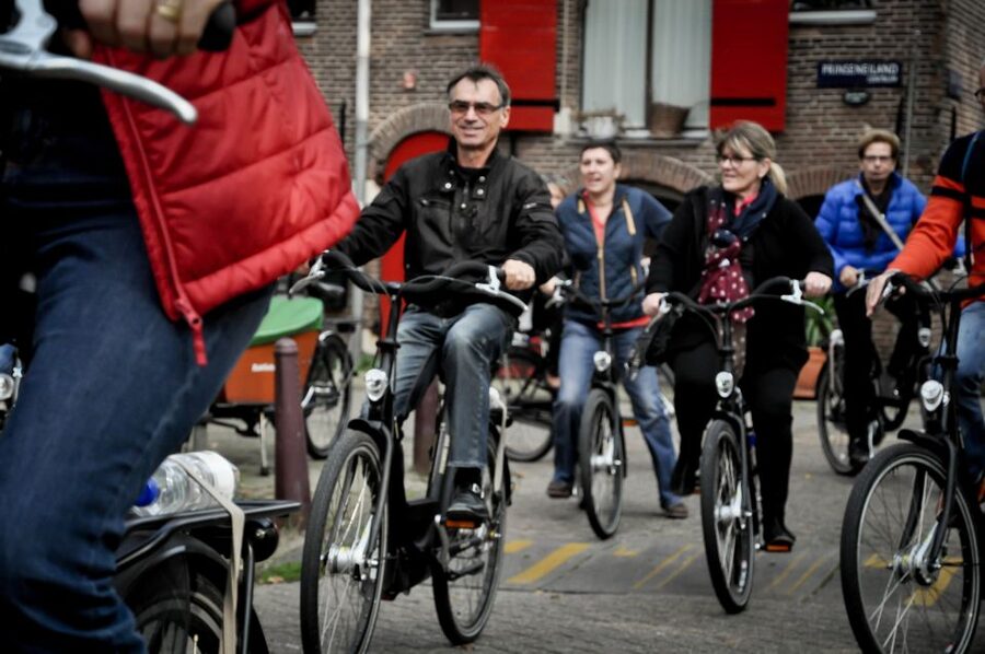 Amsterdam: Guided City Bike Tour in French - Key highlights worth knowing before you go