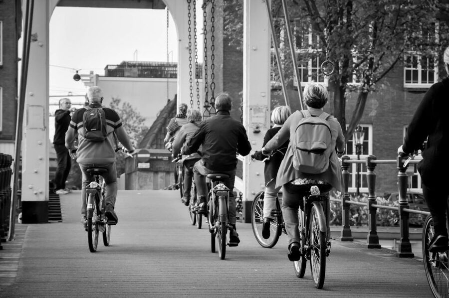 Amsterdam: Guided City Bike Tour in French - What this Amsterdam French bike tour really does for you