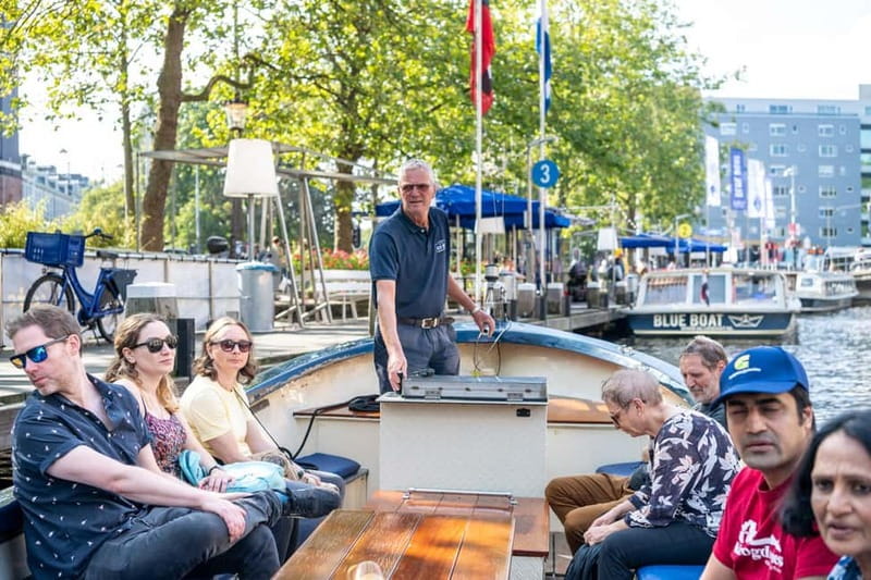 Amsterdam: Guided City Highlights Open Boat Canal Cruise - Why an open-boat “highlights” cruise makes sense in Amsterdam