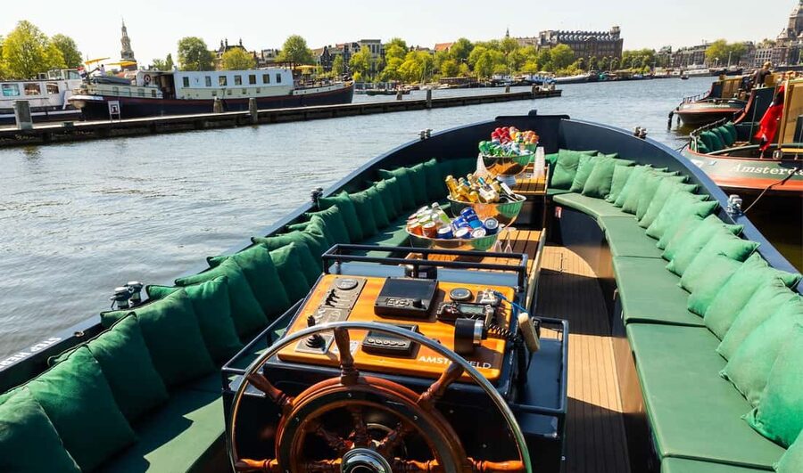 Amsterdam: Guided Open Boat Cruise Unlimited Drinks Option - What the Electric Tugboats and Open Decks Change for Your Comfort