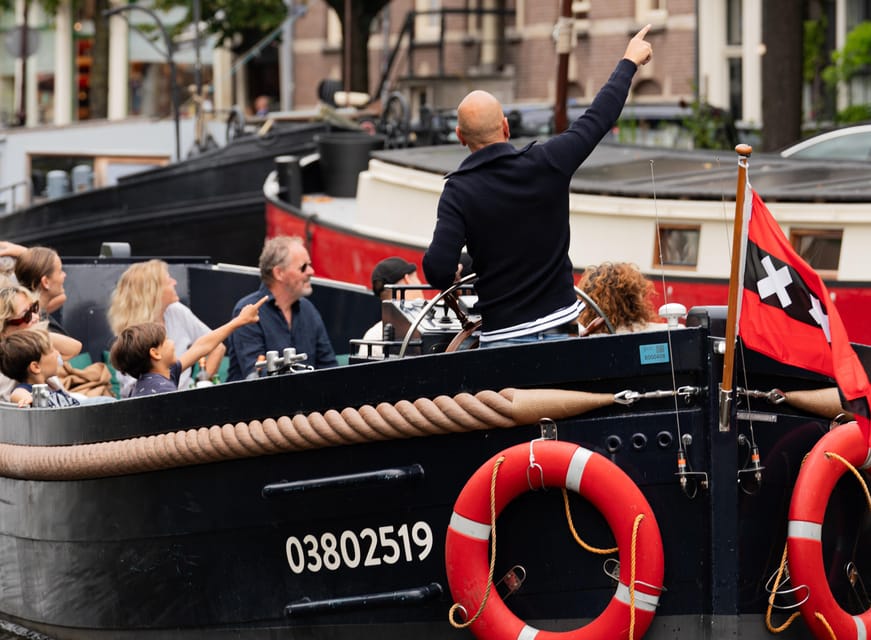 Amsterdam: Guided Open Boat Cruise Unlimited Drinks Option - What to Bring for a Breezy Hour on an Open Boat