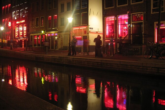 Amsterdam: Guided Red Light District and City Walking Tour - Old Town and the Red Light District connection you’ll actually feel