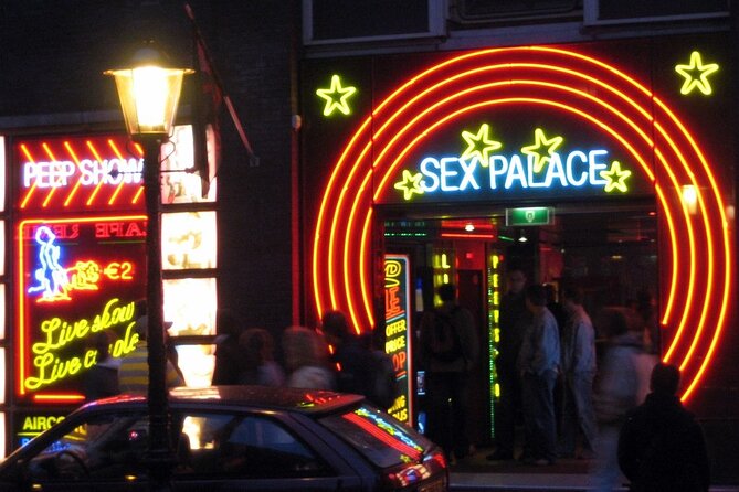 Amsterdam: Guided Red Light District and City Walking Tour - Pub The Ape (’t Aepjen): wood, fire, and survival