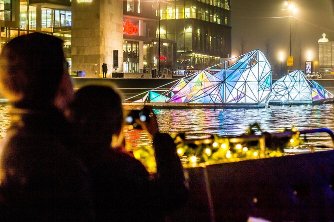 Amsterdam: heated Light Festival Cruise | Incl. Drinks Option - Stopera and the big-city finale: Stopera lights, Centraal design, and the IJ waterfront