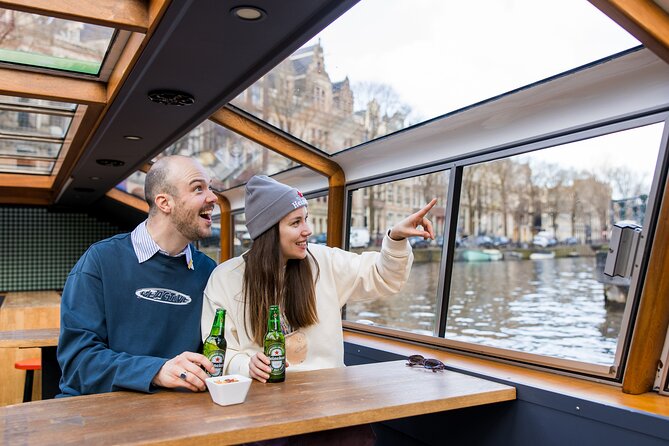 Amsterdam Heineken Cruise with 1 Heineken, Snacks, Live Guide - Entering Amsterdam by Canal: The “45 Minutes” Advantage