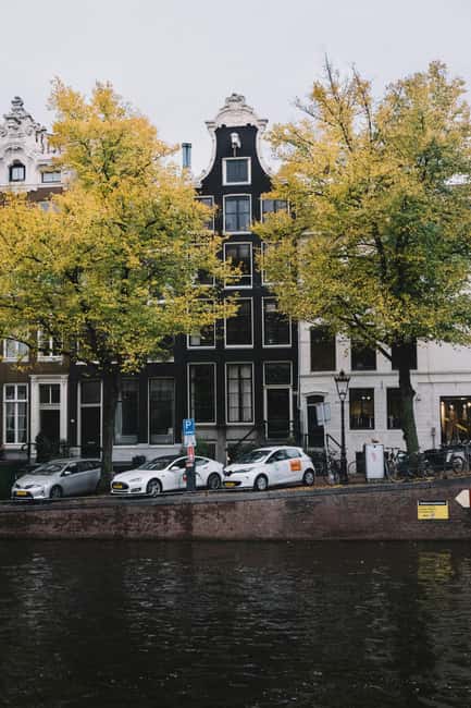 Amsterdam: Hidden Gems and Highlights in DE/EN/IT - Starting at Westermarkt and Westerkerk: A Landmark That Sets the Tone