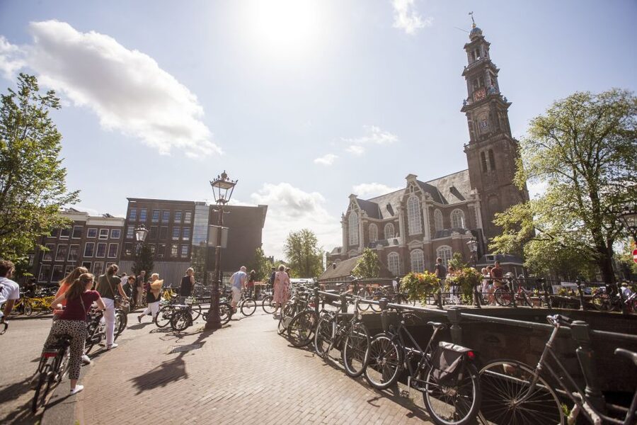 Amsterdam: Hidden Gems & Highlights Guided Bike Tour - Jordaan backstreets: the canal-ring look, plus real neighborhood corners