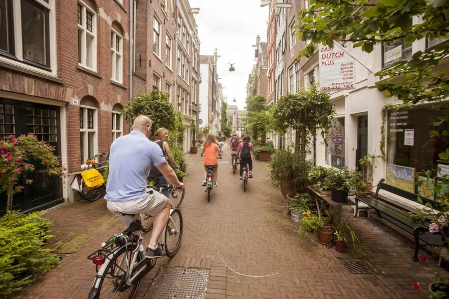 Amsterdam: Hidden Gems & Highlights Guided Bike Tour - The café hotspot break: where the tour slows down on purpose