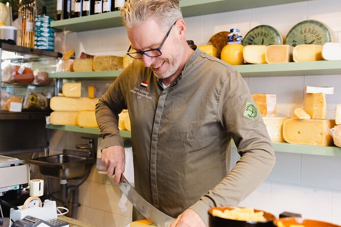 Amsterdam High-End Dutch Food & History Tour - Up to 8 guests - Saturday Tastings: Apple Pie, Market Satay, Cheese, Speakeasy Wine, and Fish