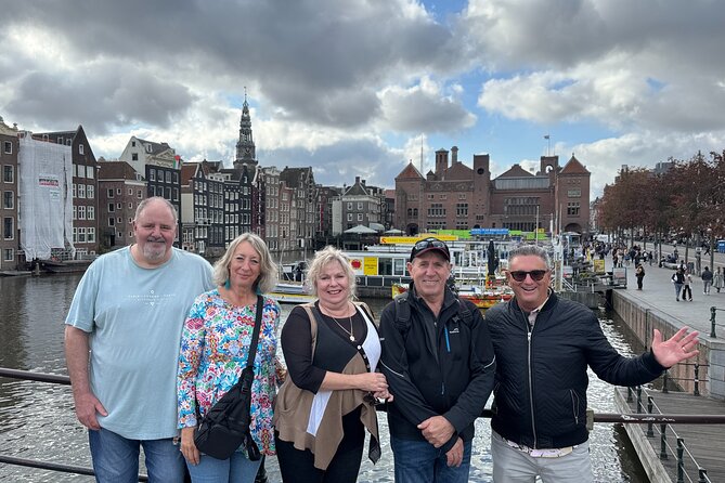 Amsterdam Highlights and Hidden Gems Walking Tour with Fun Guide - Old Harbor secret spots: seeing another Amsterdam from the water edge