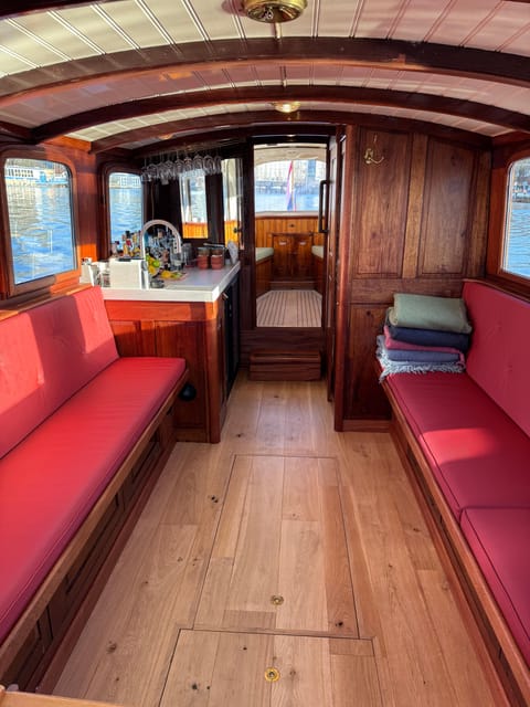 Amsterdam: Historic Boat Cruise with open bar and nibbles - Sophie (est. 1911) vs the usual canal boats