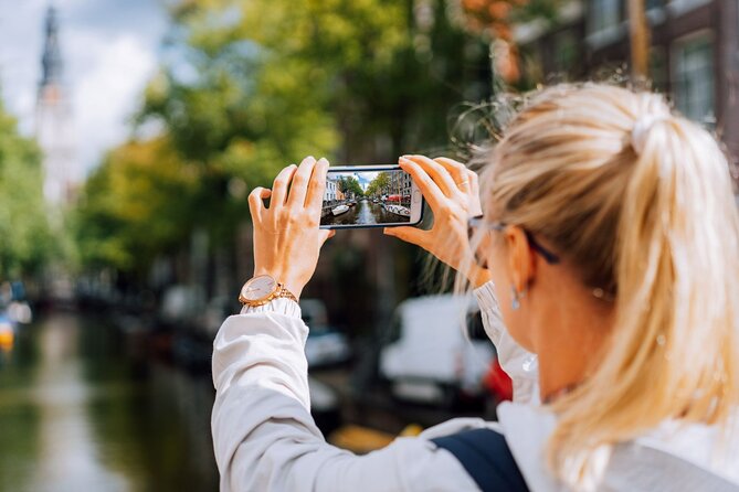 Amsterdam Historic City: a Self-Guided Augmented Reality Tour - Damrak: Start Where Amsterdam Feels Like a Main Street