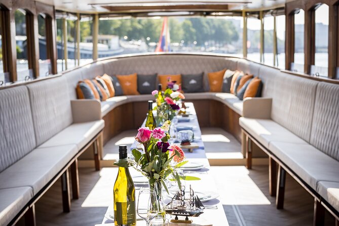 Amsterdam Historic Tour On Classic Saloon Boat - Key highlights to know before you board