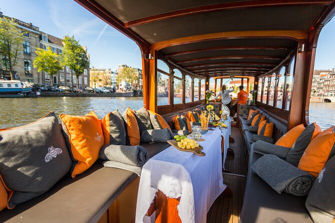 Amsterdam Historic Tour On Classic Saloon Boat - Sliding under the Skinny Bridge: the kind of stop that makes photos work