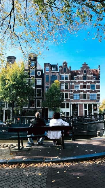 Amsterdam: Jordaan Area Walking Tour - The canal-belt feel at Prinsengracht and the “smallest house” moment