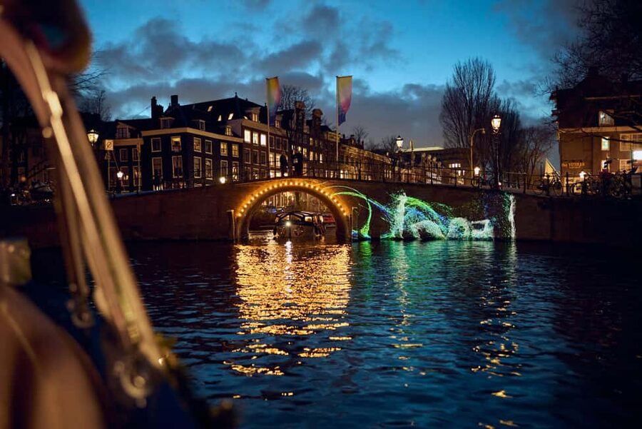 Amsterdam: Light Festival Boat with Hot Choco & Stroopwafel - Amsterdam Centraal Station and NEMO: Big Landmarks Under a Different Light