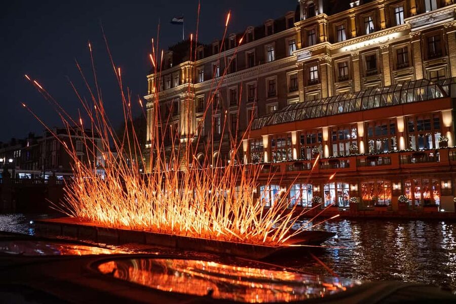 Amsterdam: Light Festival Boat with Hot Choco & Stroopwafel - How the Legacy Theme Shows Up Along the Canals