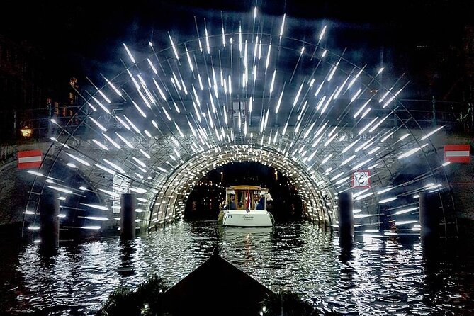 Amsterdam Light Festival: Canal Cruise + Snack & Unlimited Drinks - Cruising the Amsterdam Light Festival from the canals