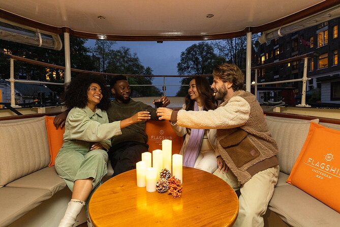Amsterdam Light Festival: Heated Cruise with Hot Drinks & Bite - Heated saloon boats: comfort comes with a view trade-off