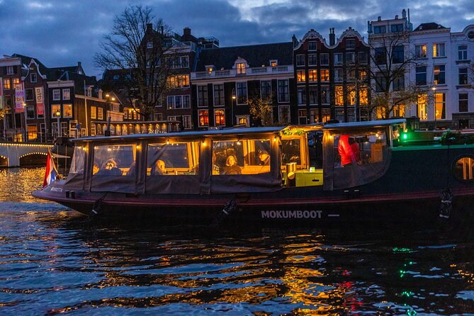 Amsterdam: Light Festival Open Boat - Unl. Drinks Option - NEMO’s Hands On stop: science that isn’t stuck in a classroom