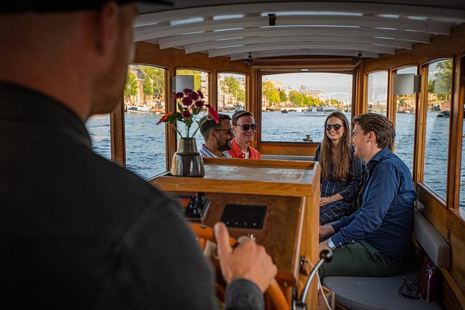 Amsterdam Light Festival Private Cruise With Welcome Drink - Amsterdam Light Festival From a 12-Seat Boat: The Big Difference