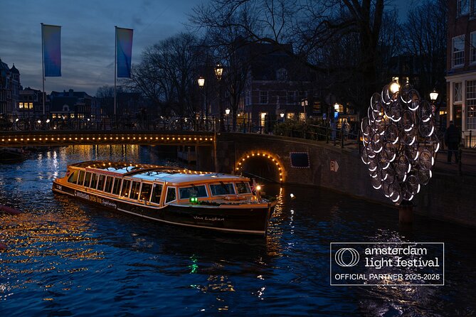 Amsterdam Light Festival Tour in German | Including Drinks - Anne Frank House by the Prinsengracht: Quiet Power on a Night Cruise