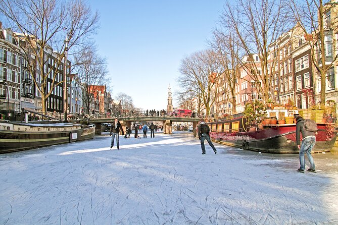 Amsterdam Light Festival Winter Walk with Stroopwafel Workshop - Bloemenmarkt Canals and Photo Stops During Light Festival Season
