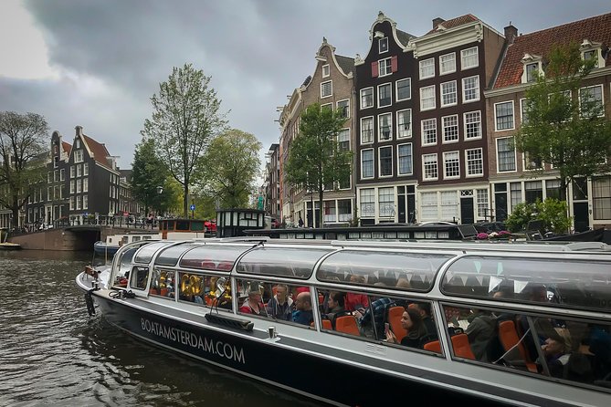 Amsterdam Live Guided Sightseeing Canal Cruise - Best Timing: Day-to-Night Canal Magic