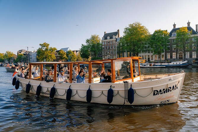 Amsterdam: Luxury Boat Cruise Unlimited Cocktails, Beers & Wines - Price and value: $34.18 for an hour of drinks and canals