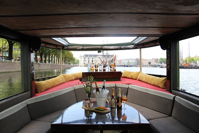 Amsterdam: Luxury Boat Cruise Unlimited Cocktails, Beers & Wines - Getting the most out of boarding near Krasnapolsky and Dam Square