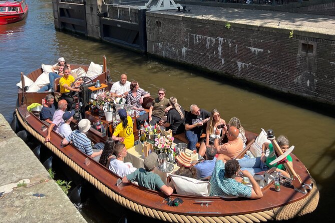 Amsterdam Luxury Boutique Boat tour with Unlimited Beer and Wine - Unlimited beer and wine: value, add-ons, and what could change