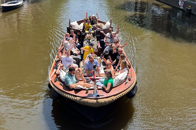 Amsterdam Luxury Boutique Boat tour with Unlimited Beer and Wine - Open boat vs covered roof: the sightline issue you can control