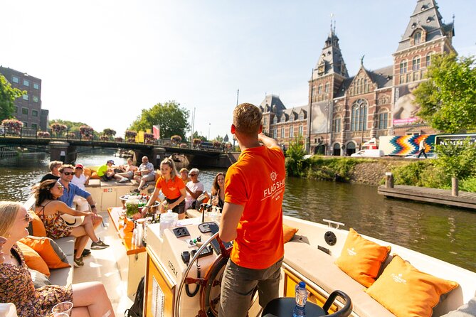 Amsterdam Luxury Canal Cruise + Unlimited Drinks & Bites option - Westerkerk, Carré, and the canal-city mix