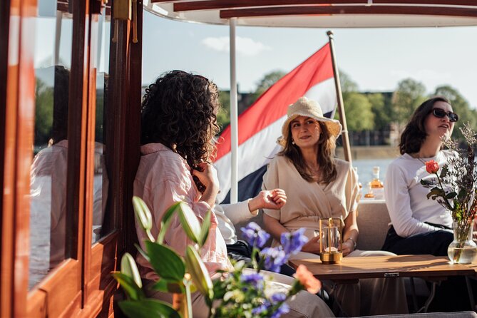 Amsterdam: Luxury Saloon Boat Cruise with Cocktails & Waffle - Meeting points and drop-offs: choose the one that saves you time