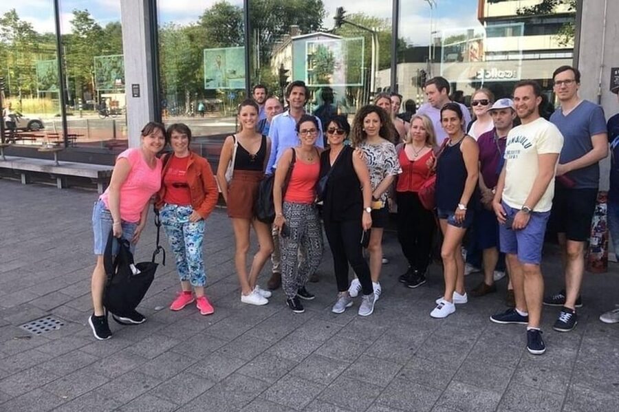 Amsterdam: Must-See Attractions Guided Walking Tour - The Red Light District stop: seeing it with context, not just headlines