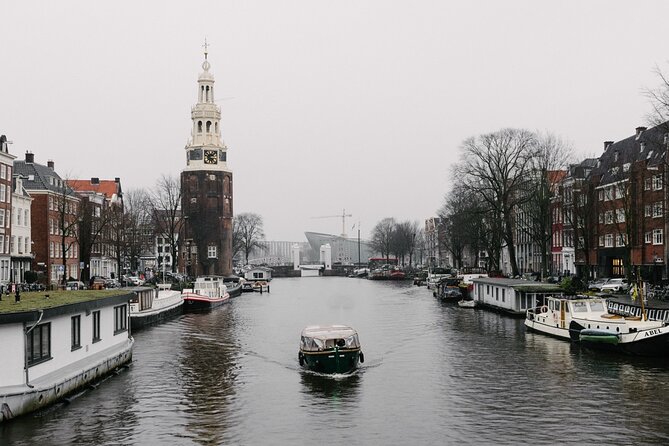 Amsterdam Newest Canal Cruise with local guide and small group - First stop: the Canal Ring (Grachtengordel) and UNESCO views from the water