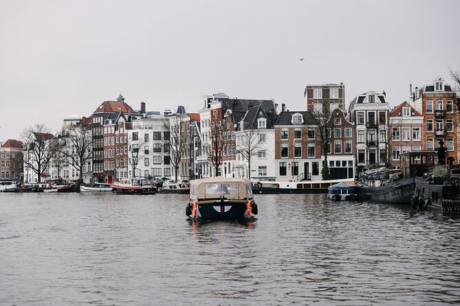 Amsterdam Newest Canal Cruise with local guide and small group - Hendrick de Keyser’s 1606 spire: how defensive towers became civic icons