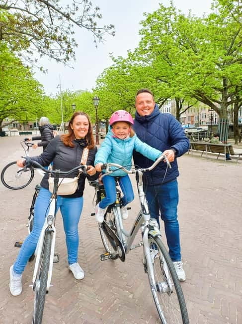 Amsterdam: Off the Beaten Path Bike Tour in French - Pushing north: warehouses, Plantage, and the city’s quieter logic