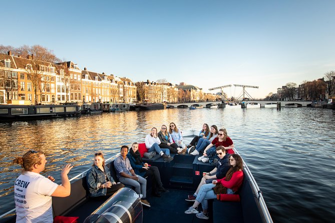 Amsterdam Open Boat Cruise in Old City Center with Live Guide - Price and value: $23.97 for a guided hour on the canals