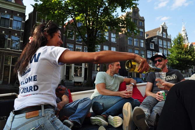 Amsterdam Open Boat Cruise with Live Guide and Two Drinks - Westerkerk, Westertoren, and the city’s church-and-steeple skyline