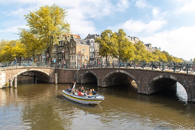 Amsterdam Open Boat Tour with Local Guide - Entering the canals: what this open-boat tour is really like