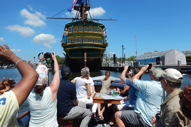 Amsterdam Open Boat Tour with Local Guide - What to wear and bring on an open boat in Amsterdam