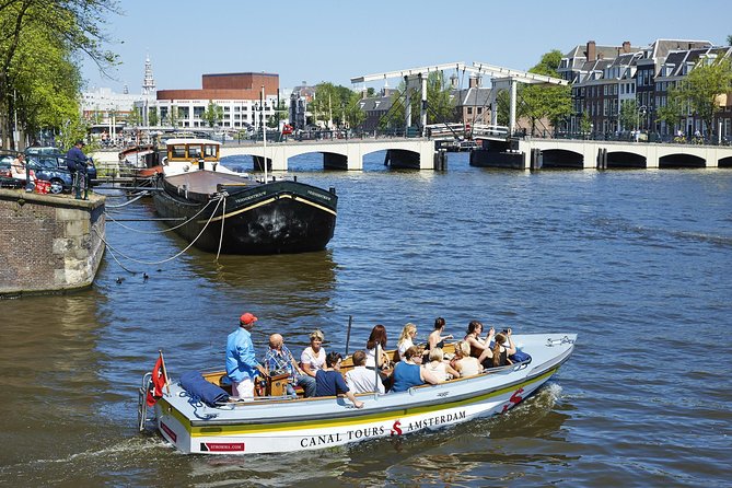 Amsterdam Open Boat Tour with Local Guide - Getting there without stress: departure times and transit-friendly location