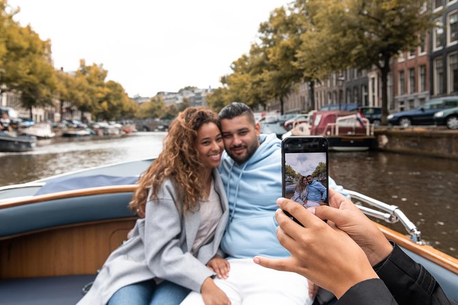 Amsterdam Open Boat Tour with Local Guide - Captain-led narration: why it beats an audio-only cruise